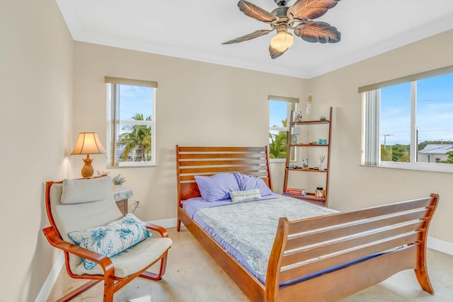 bedroom with multiple windows, crown molding, and ceiling fan