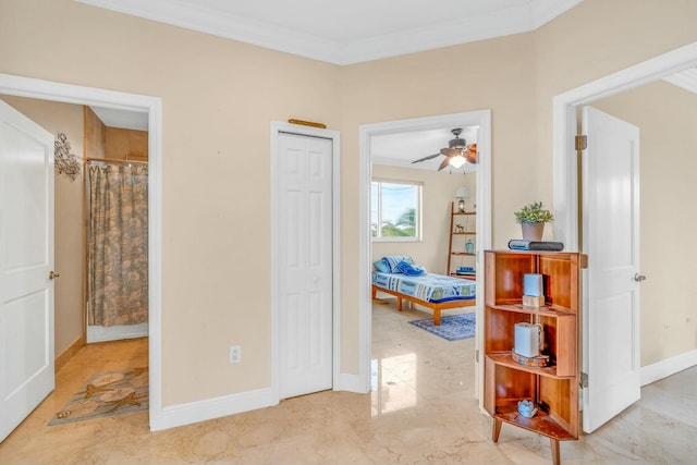 hall featuring ornamental molding