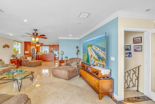 living room with crown molding and ceiling fan