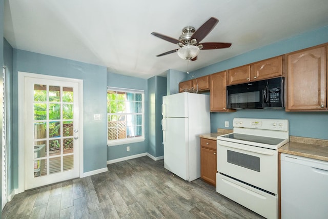 3314 Northside Dr Unit 145, Key West, FL 33040 - kitchen with white appliances, wood finished floors, a ceiling fan, brown cabinetry, and light countertops