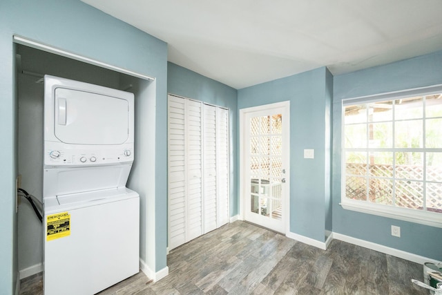 3314 Northside Dr Unit 145, Key West, FL 33040 - laundry room featuring estacked washer and dryer and wood finished floors