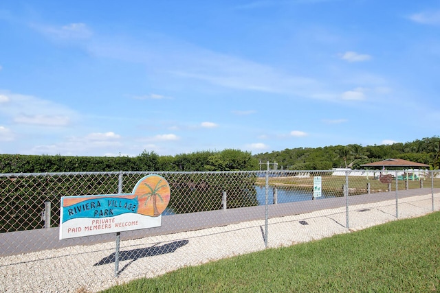 view of property's community featuring a water view