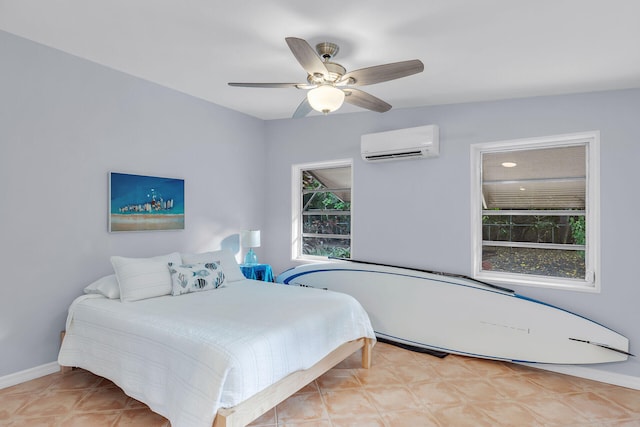 bedroom featuring ceiling fan and a wall unit AC