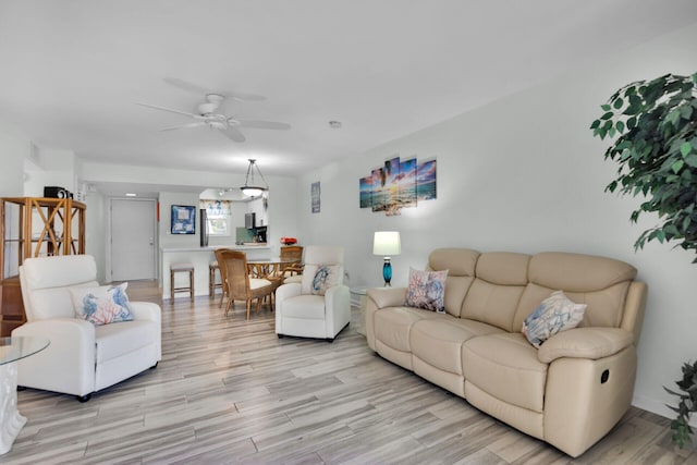 389 N Anglers Dr Unit 105, Marathon, FL 33050 - living area with a ceiling fan and light wood-style floors