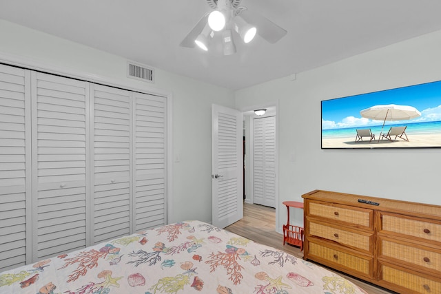 389 N Anglers Dr Unit 105, Marathon, FL 33050 - bedroom with wood finished floors, a closet, and ceiling fan