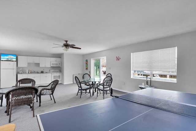 389 N Anglers Dr Unit 105, Marathon, FL 33050 - dining space featuring ceiling fan and light carpet