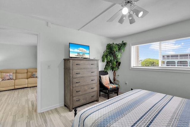 389 N Anglers Dr Unit 105, Marathon, FL 33050 - bedroom with light wood-type flooring and ceiling fan