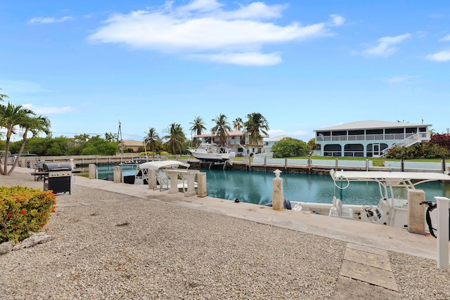 389 N Anglers Dr Unit 105, Marathon, FL 33050 - view of swimming pool featuring a grill, a boat dock, and a water view