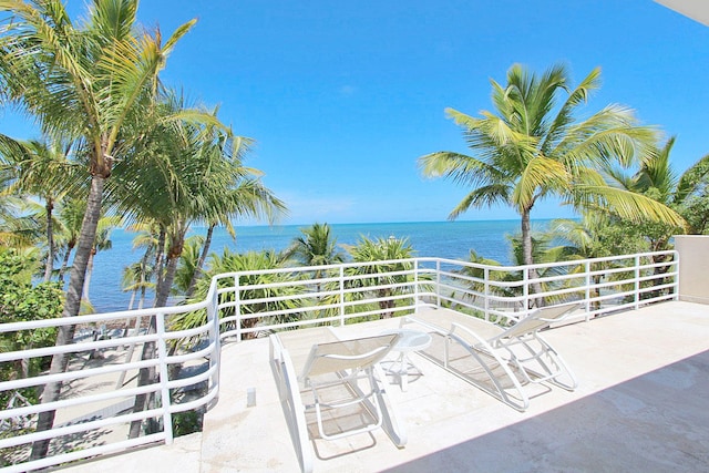 view of patio / terrace with a water view