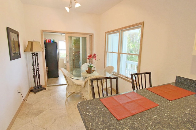 dining room featuring plenty of natural light