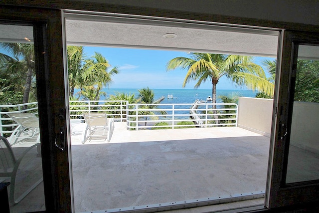 doorway featuring a water view