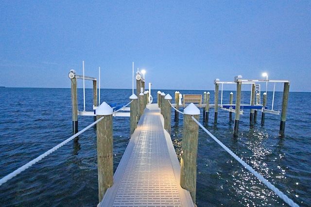 view of dock with a water view