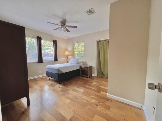 bedroom featuring ceiling fan and light wood-type flooring