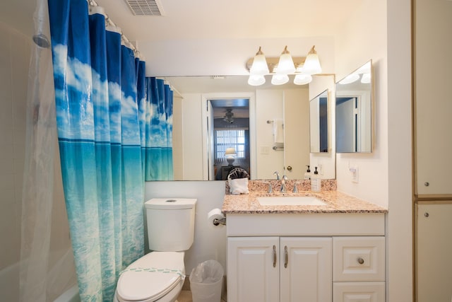 full bathroom with visible vents, shower / bathtub combination with curtain, toilet, a ceiling fan, and vanity