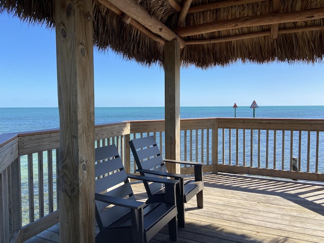 deck featuring a water view