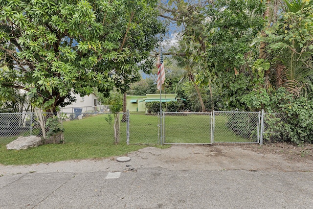 view of yard featuring a gate and fence