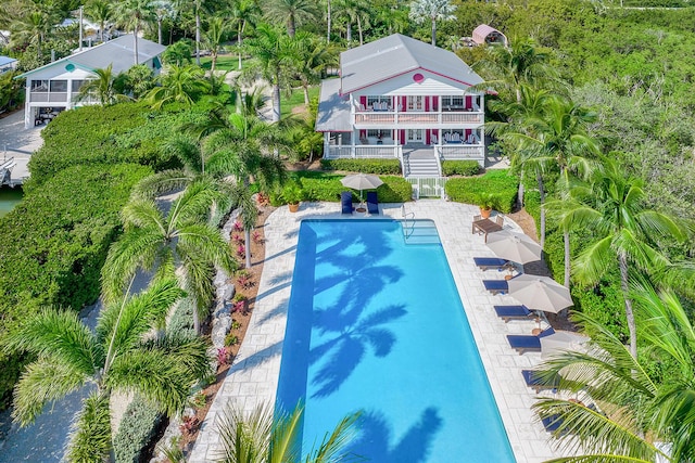 view of pool featuring a patio area