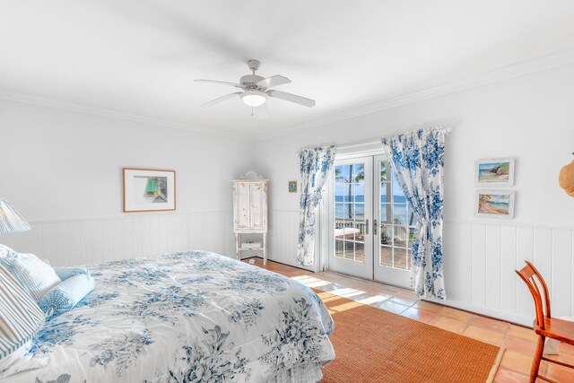 tiled bedroom with a water view, crown molding, french doors, and access to outside