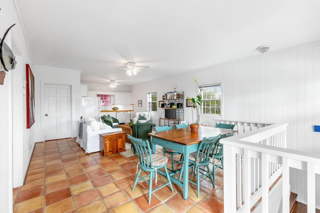 dining space featuring ceiling fan