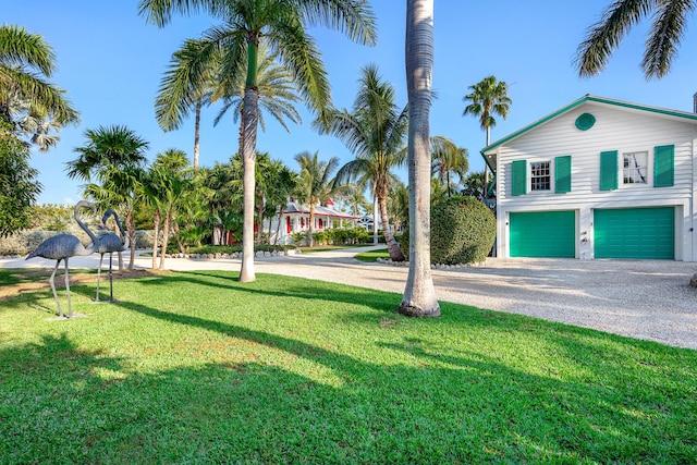 view of yard with a garage