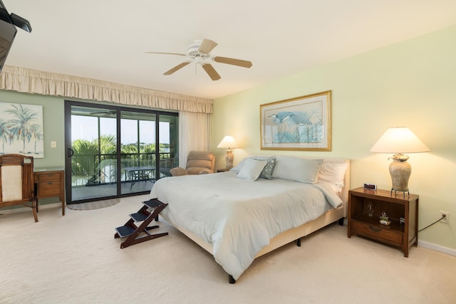 carpeted bedroom featuring access to outside and ceiling fan