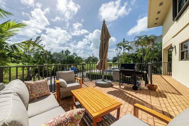 wooden terrace featuring an outdoor living space