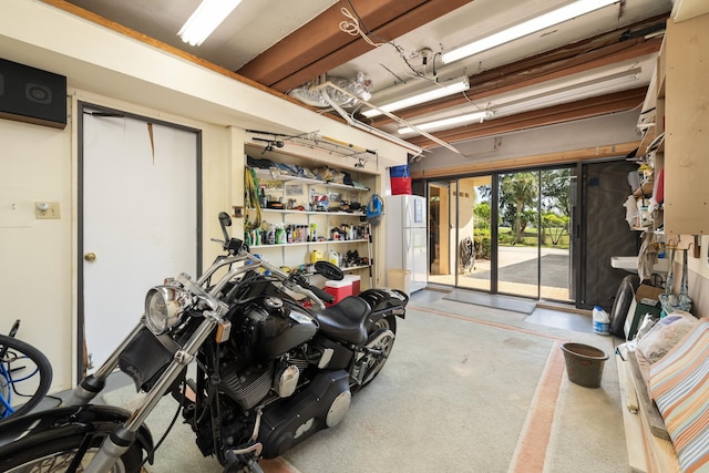 garage with white refrigerator