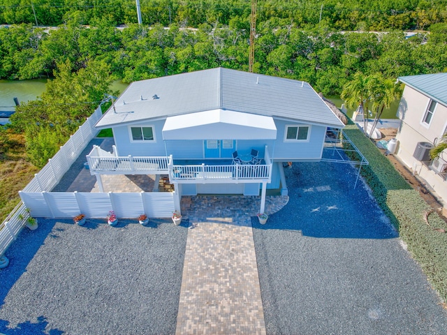 176 Iroquois Dr, Islamorada, FL 33036 - exterior space featuring decorative driveway and fence