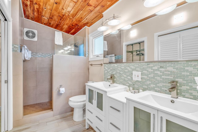 176 Iroquois Dr, Islamorada, FL 33036 - bathroom with tile walls, visible vents, toilet, wood ceiling, and walk in shower