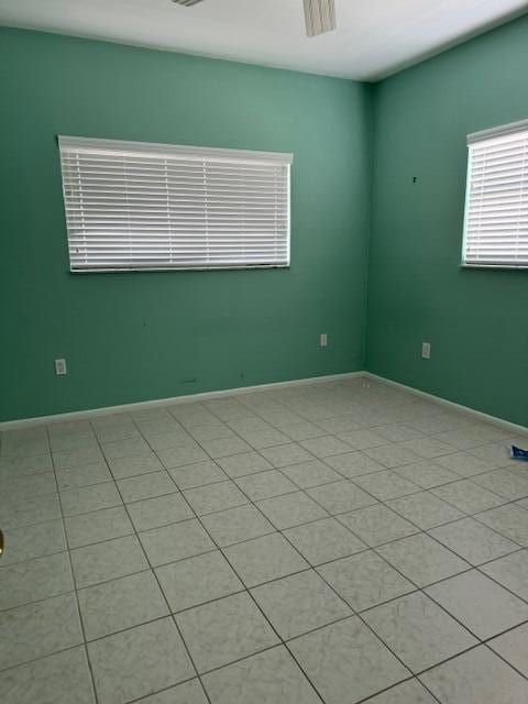 spare room featuring ceiling fan