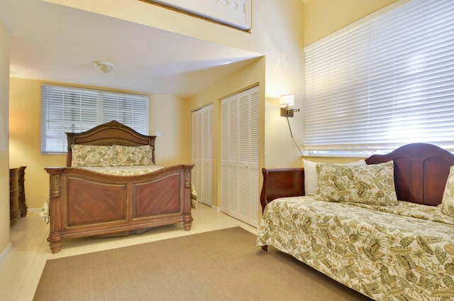 bedroom with multiple closets