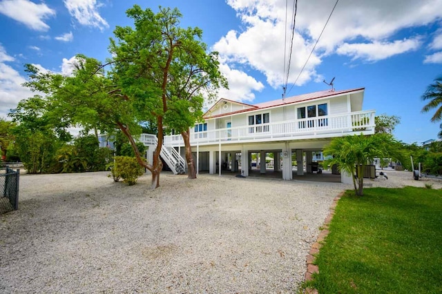 coastal inspired home with a carport