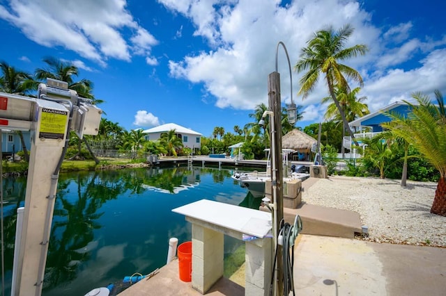 dock area featuring a water view