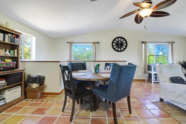 133 Valois Blvd, Key Largo, FL 33037 - dining area featuring ceiling fan, baseboards, lofted ceiling, and a wealth of natural light
