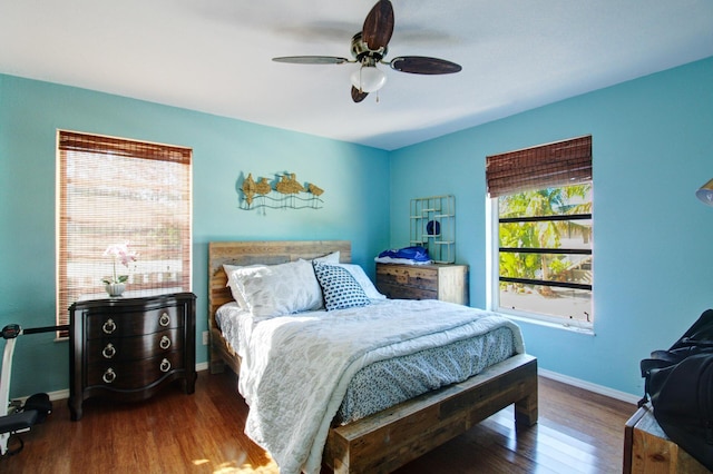 133 Valois Blvd, Key Largo, FL 33037 - bedroom with baseboards, a ceiling fan, and wood finished floors