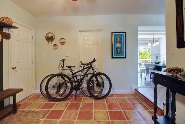 133 Valois Blvd, Key Largo, FL 33037 - dining space with an inviting chandelier and baseboards