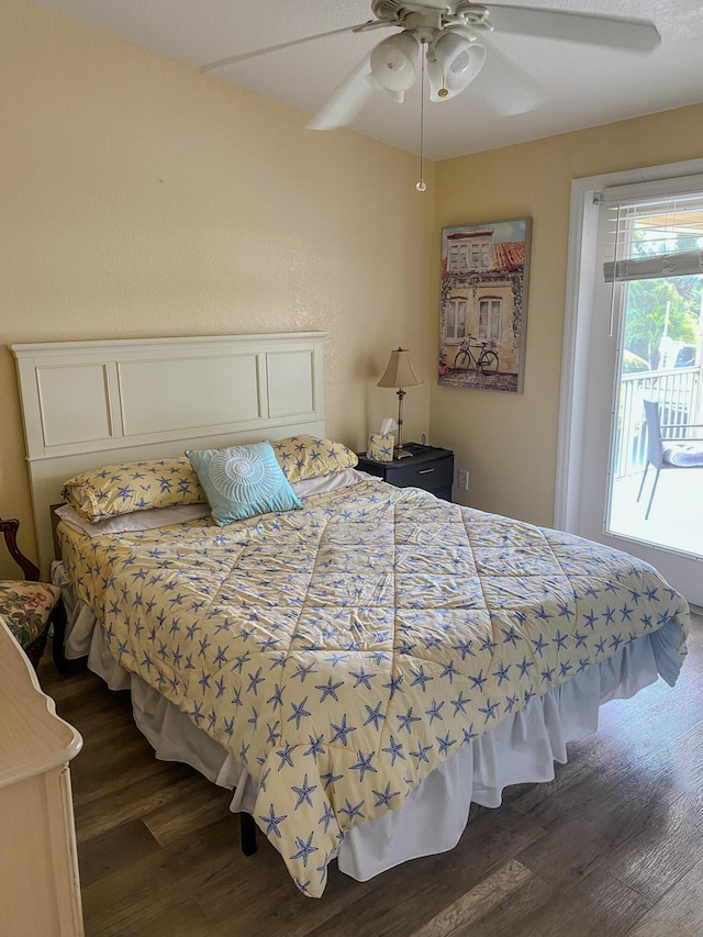 bedroom featuring ceiling fan and dark hardwood / wood-style flooring