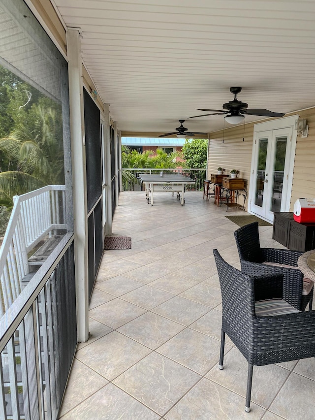 view of patio with ceiling fan and french doors