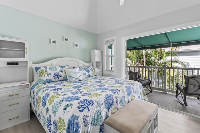 bedroom with light hardwood / wood-style flooring and access to outside