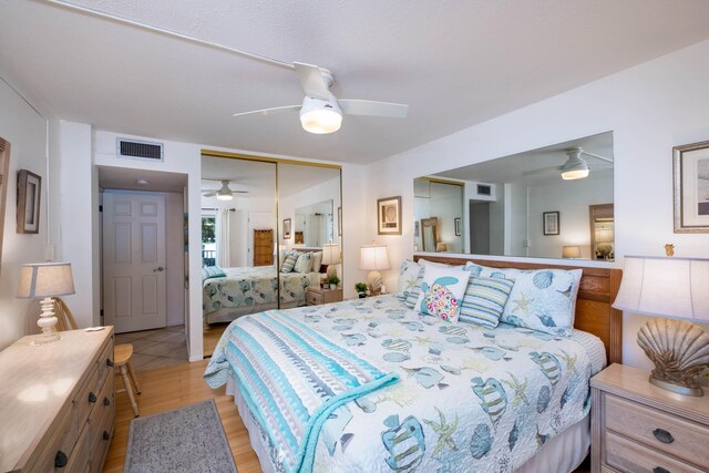 bedroom featuring a closet and ceiling fan