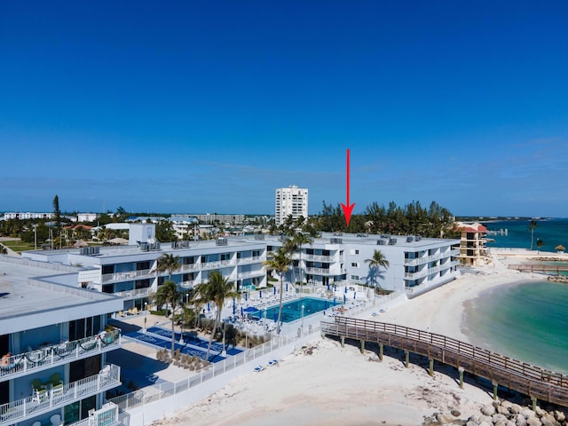 aerial view featuring a water view and a view of the beach