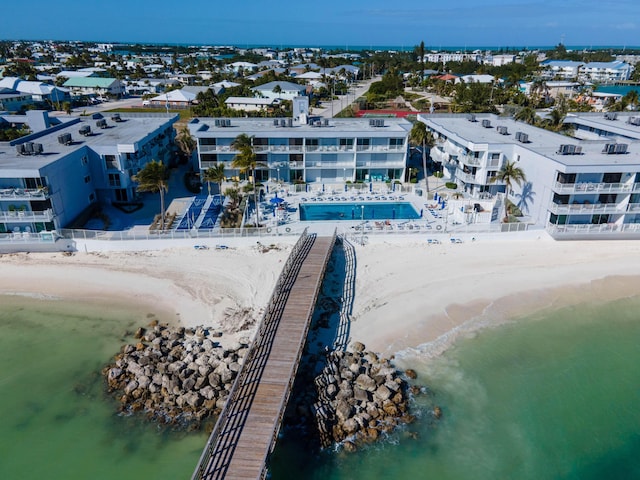 aerial view featuring a view of the beach and a water view