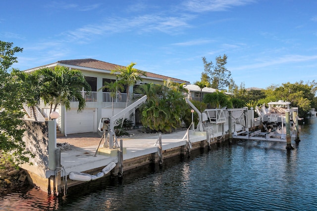 view of dock with a water view and boat lift