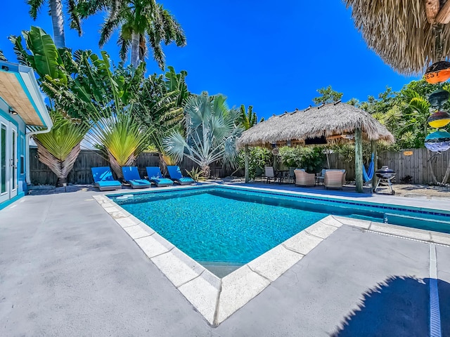 view of pool featuring a gazebo and a patio