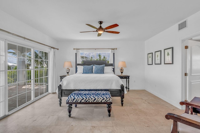 1330 Coury Dr, Key Colony, FL 33051 - bedroom featuring access to exterior, ceiling fan, and baseboards