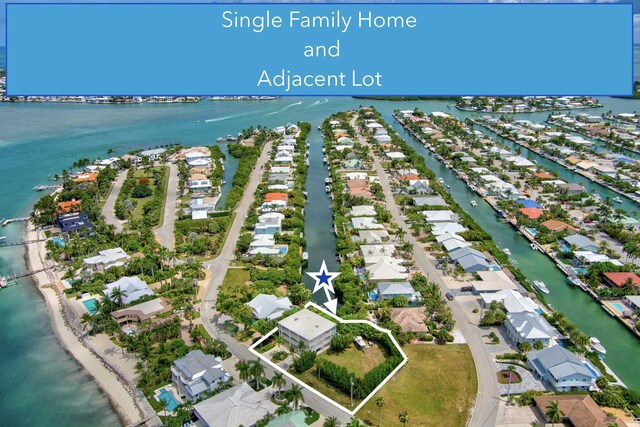 1330 Coury Dr, Key Colony, FL 33051 - aerial view of residential area featuring a nearby body of water
