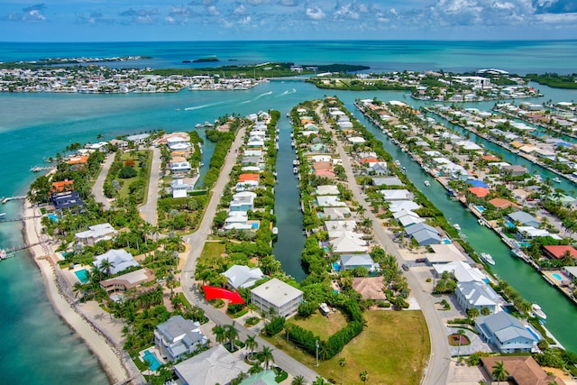 1330 Coury Dr, Key Colony, FL 33051 - aerial perspective of suburban area featuring a large body of water