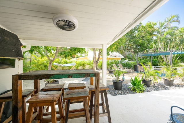 view of patio / terrace featuring ceiling fan