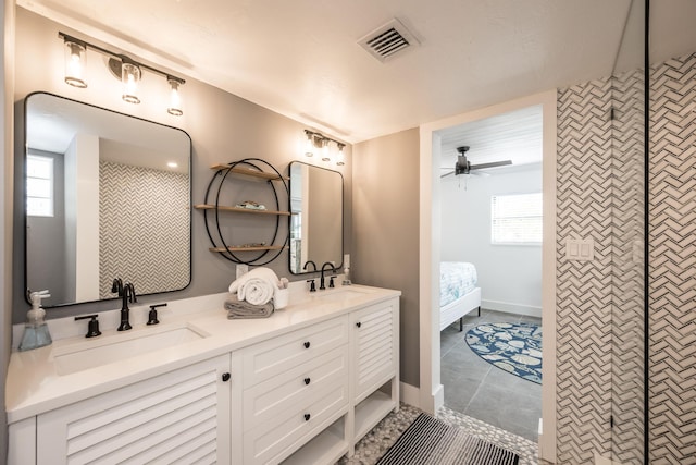 bathroom with ceiling fan, vanity, and tile patterned flooring