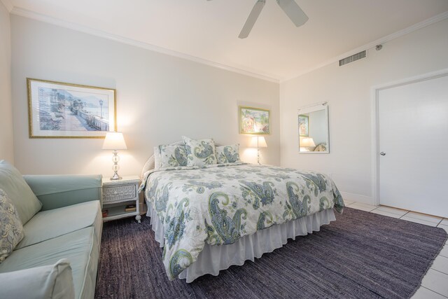 115 Front St Unit 202, Key West, FL 33040 - bedroom featuring tile patterned floors, ornamental molding, and ceiling fan